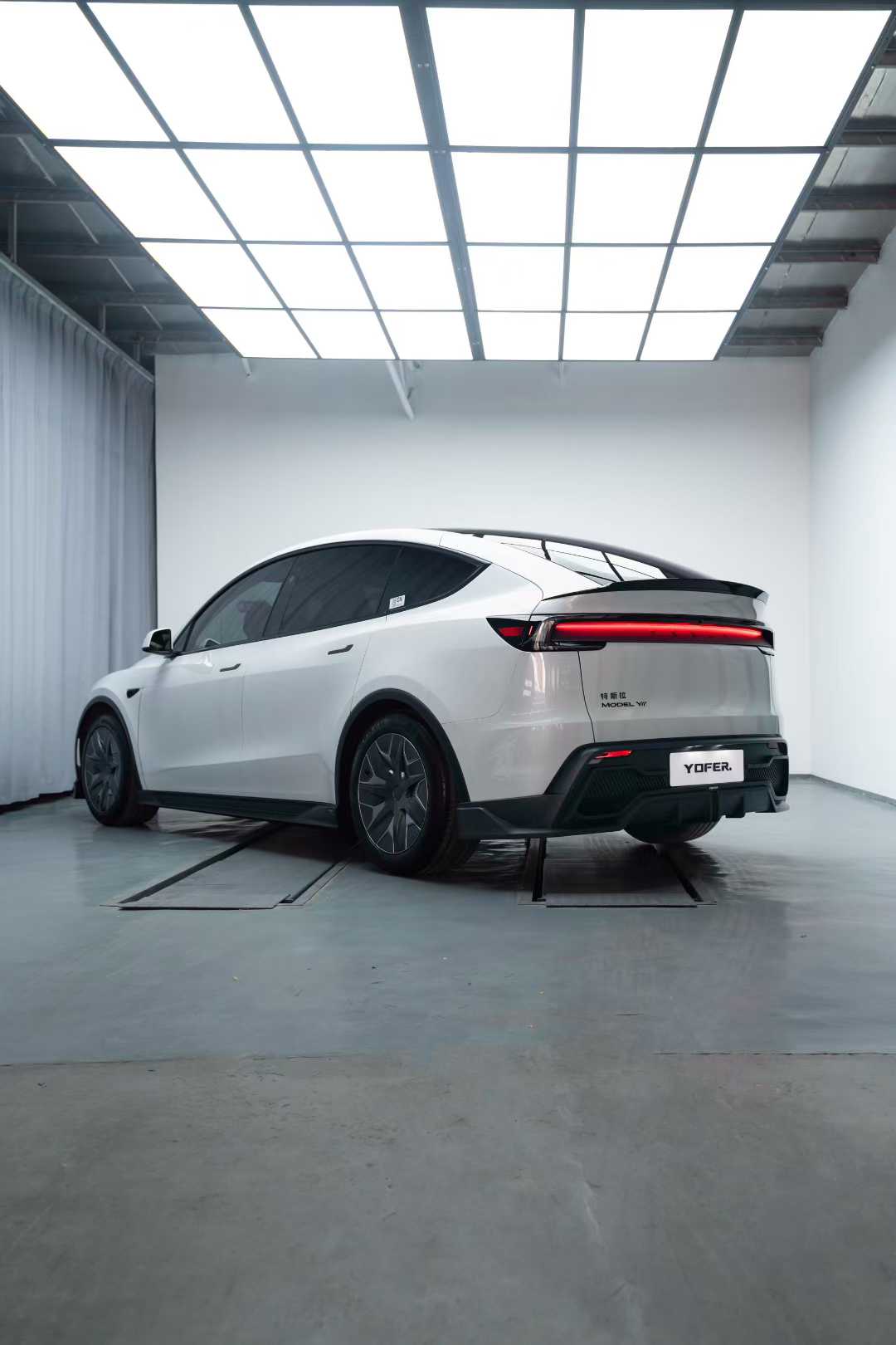 Tesla Model Y Juniper 2026-ON with Aftermarket Parts - Loong Flames Rear Diffuser PP Polypropylene from Yofer.co